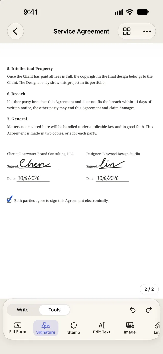 Page 2 of a contract on iPhone with both parties' signatures, the dates, and a checked box
